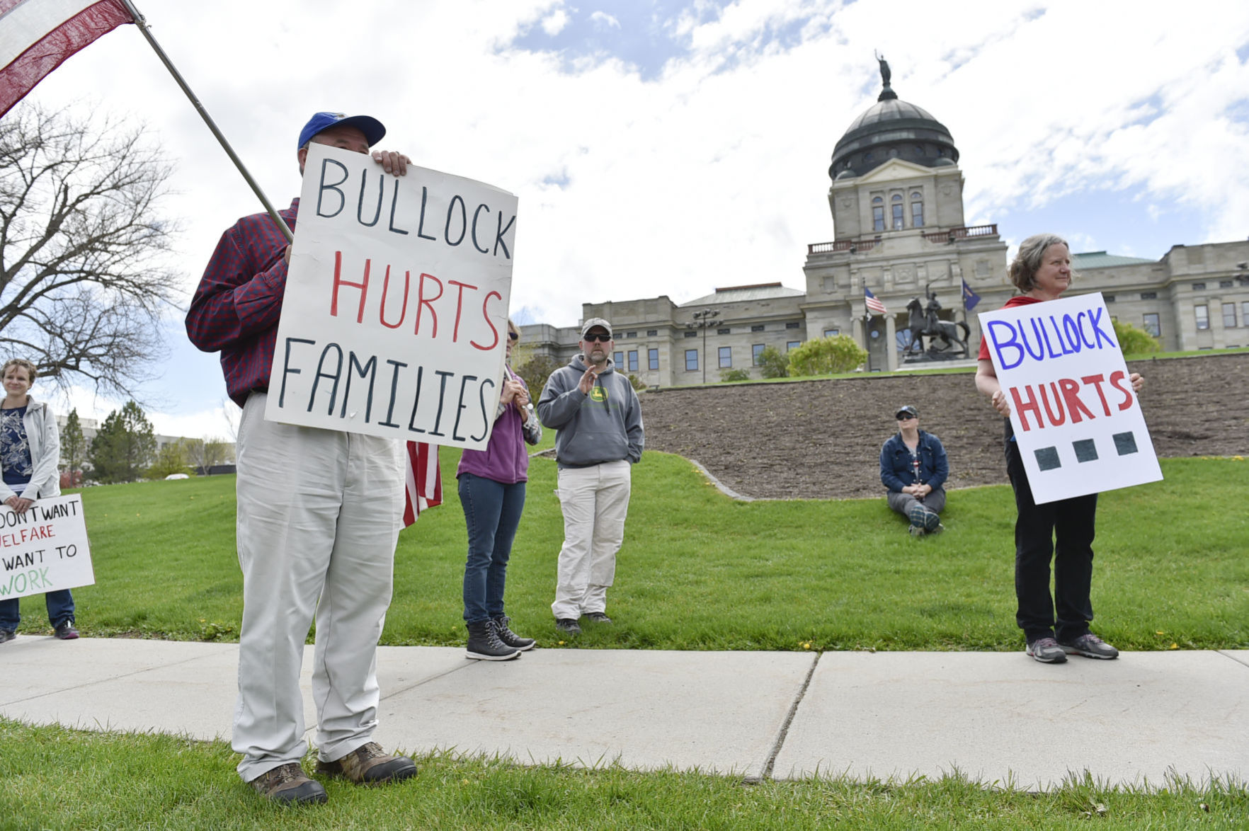 Protesters gather outside the Montana State Capitol Wednesday criticizing Gov. Steve Bullock's response to the COVID-19 pandemic.